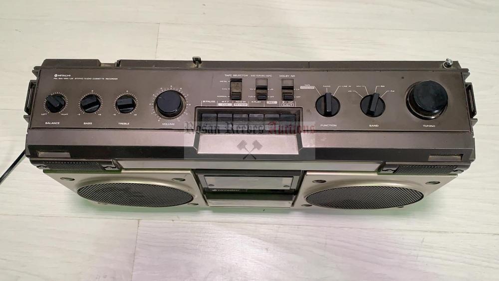 A Hitachi TRK-8200E stereo cassette recorder (no handle or aerial)