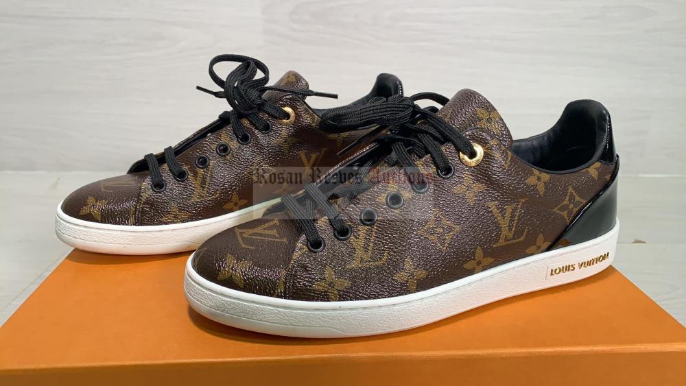 A pair of Louis Vuitton MS0260 brown leather sneakers size 38.5 with dust  bag and box