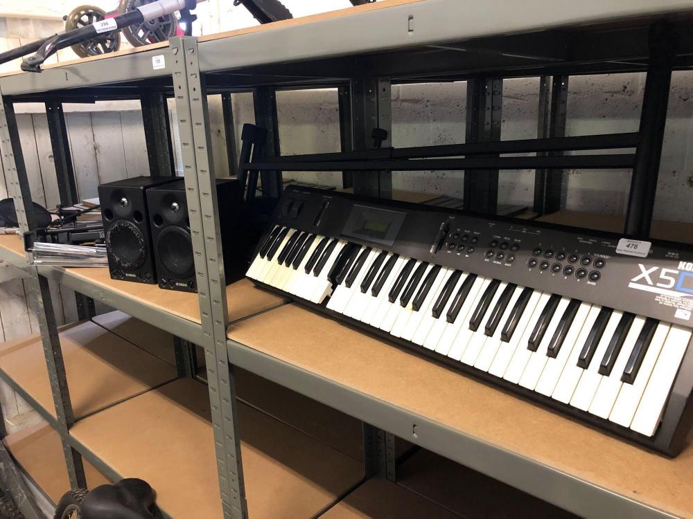 A Korg X5D music synthesizer (broken keys) with stand, a pair of