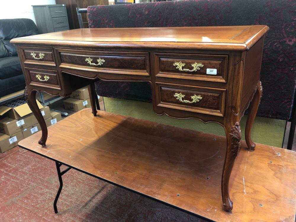 A Hardwood Writing Desk Fitted With 5 Drawers With Ornate Brass