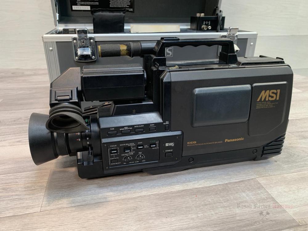 A Panasonic NV-MS1 S-VHS movie camera with Panasonic VW-SHS1 movie
