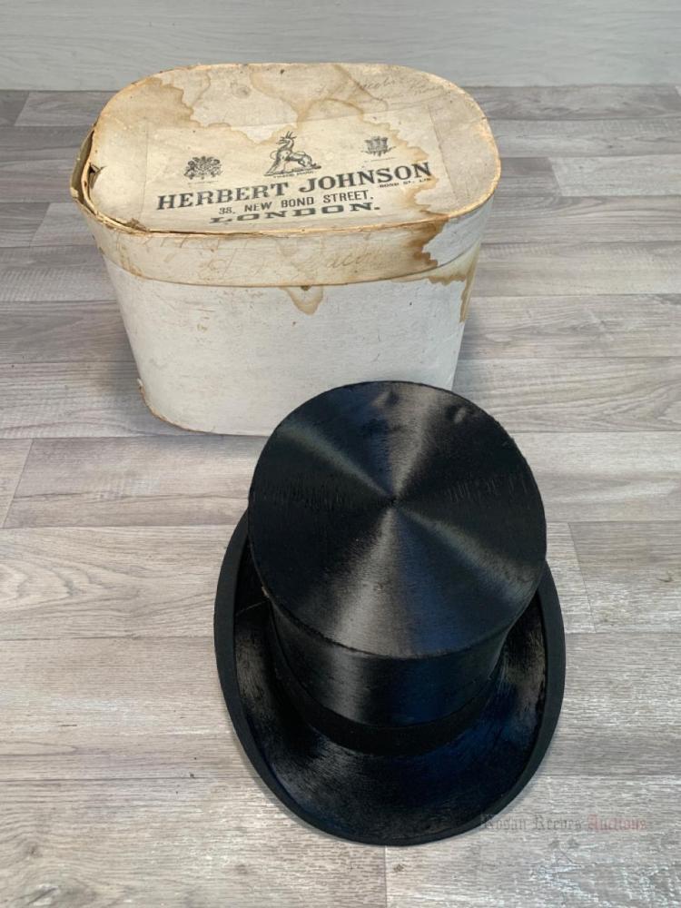 A vintage Herbert Johnson black top hat with box