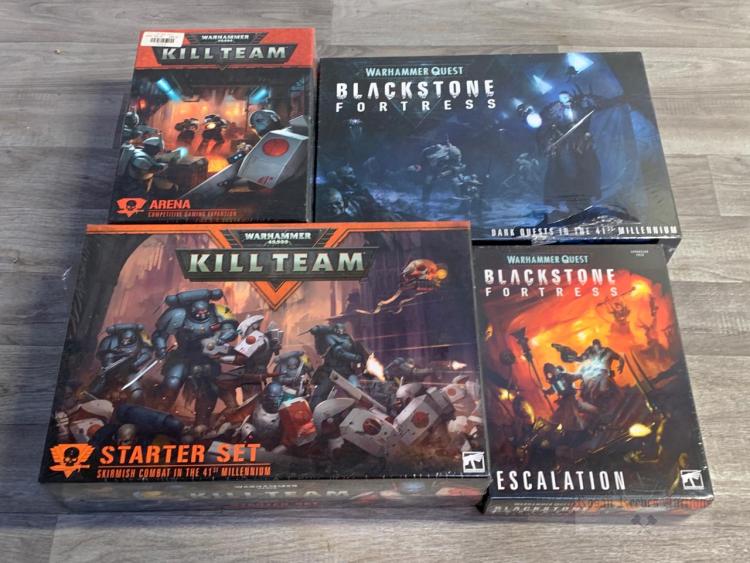 *A carton containing a packaged Warhammer 40,000 Kill Team skirmish ...