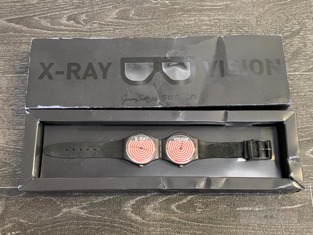 A Swatch Jeremy Scott X-Ray Vision watch with box