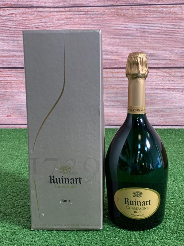 A 750ml bottle of Ruinart brut champagne with presentation box