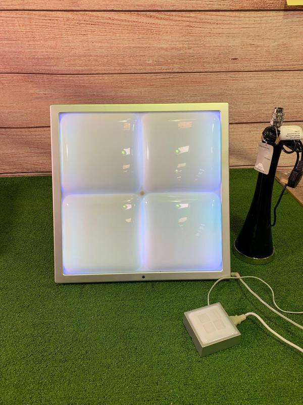 A Traxon mood light model no ML 1080 no remote control and a John Lewis black glass table lamp