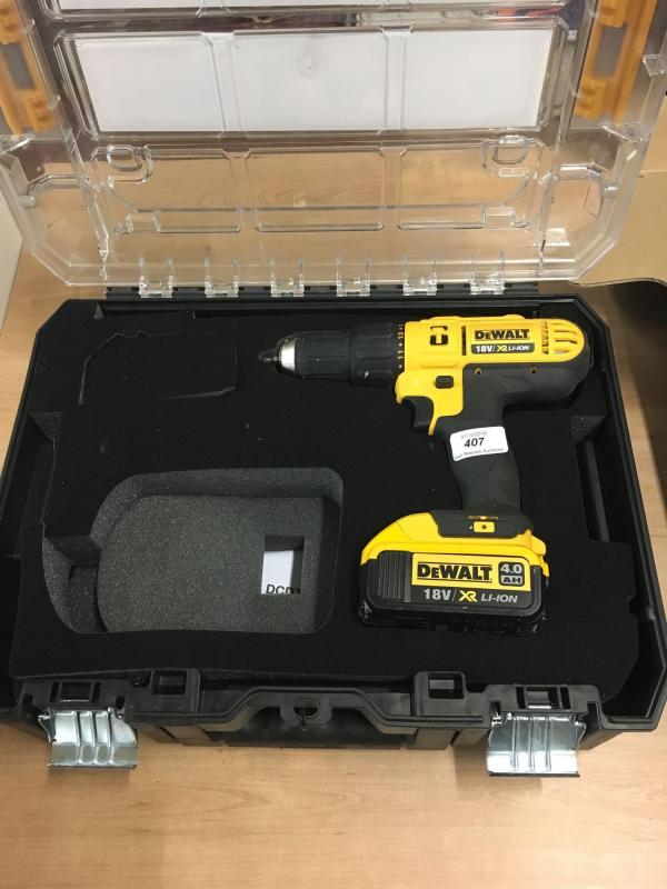 A Dewalt DCD776 cordless combi drill with carry case (no charger).